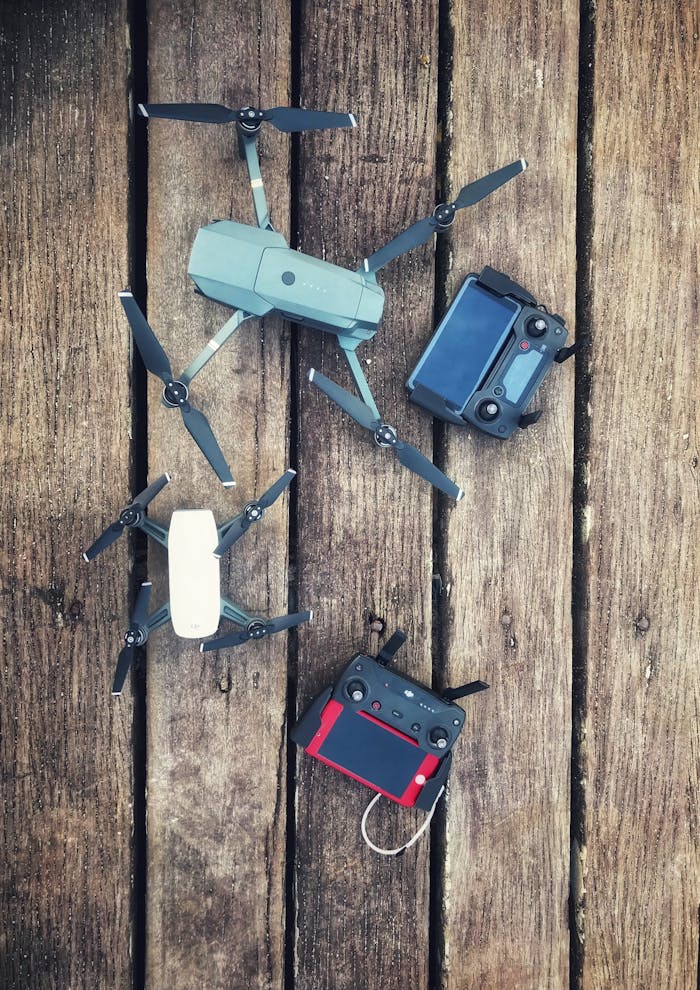 Two Assorted Quadcopter Drones With Controllers